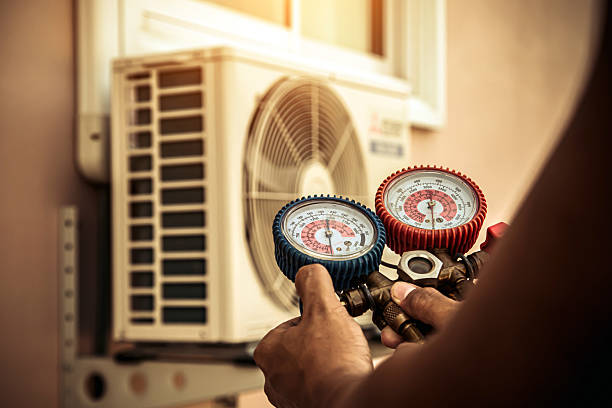 Professional Heat Pump Repair technician working in Needham, MA